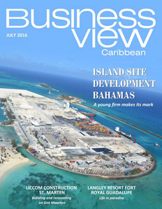 July 2016 cover of Business View Caribbean, digital magazine. Showing an island aerial view with blue sky and water.