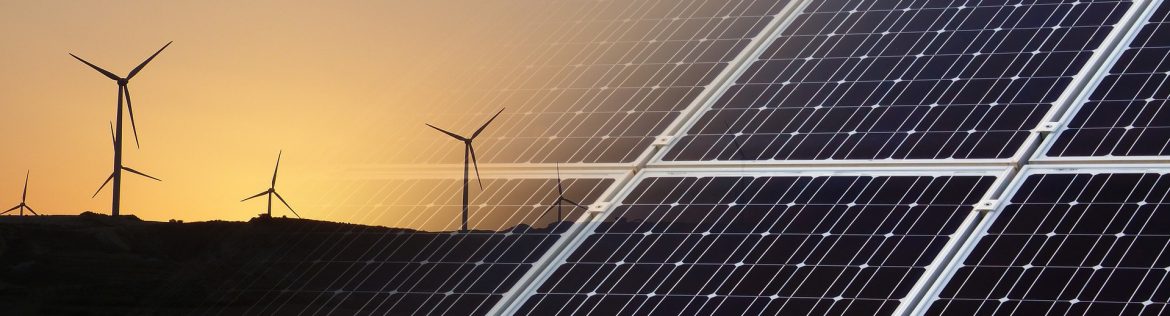Wind turbines on the left and a solar panel faded in on the right. Bonaire Aims to be the First Renewable Island Relying on Wind and Solar