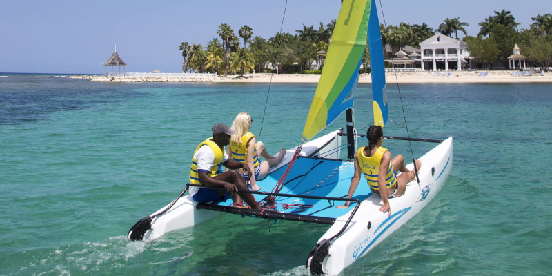 Half Moon Resort, Jamaica. Guests riding on a sailboat.