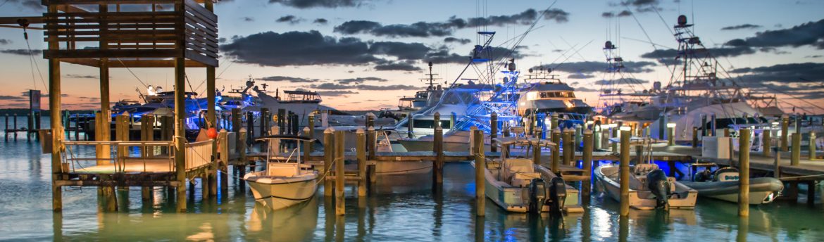 Valentines Residences, Resort and Marina Bahamas boat dock at dusk.
