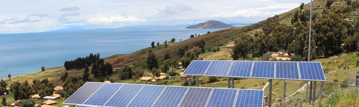 Jamaica Government Expanding Energy Sector To Generate More Jobs. Photo of solar panels on a Caribbean island hillside.