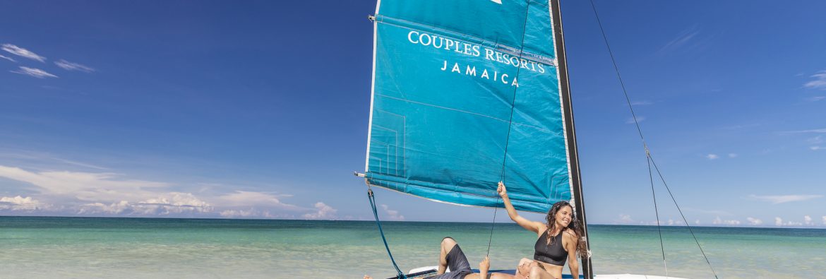Couples Resort Jamaica, a couple on a sailboat
